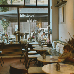 A cafe with circle tables in view